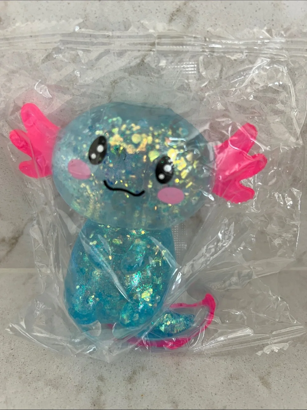 Blue Glitter Axolotl Squishy and slow rise